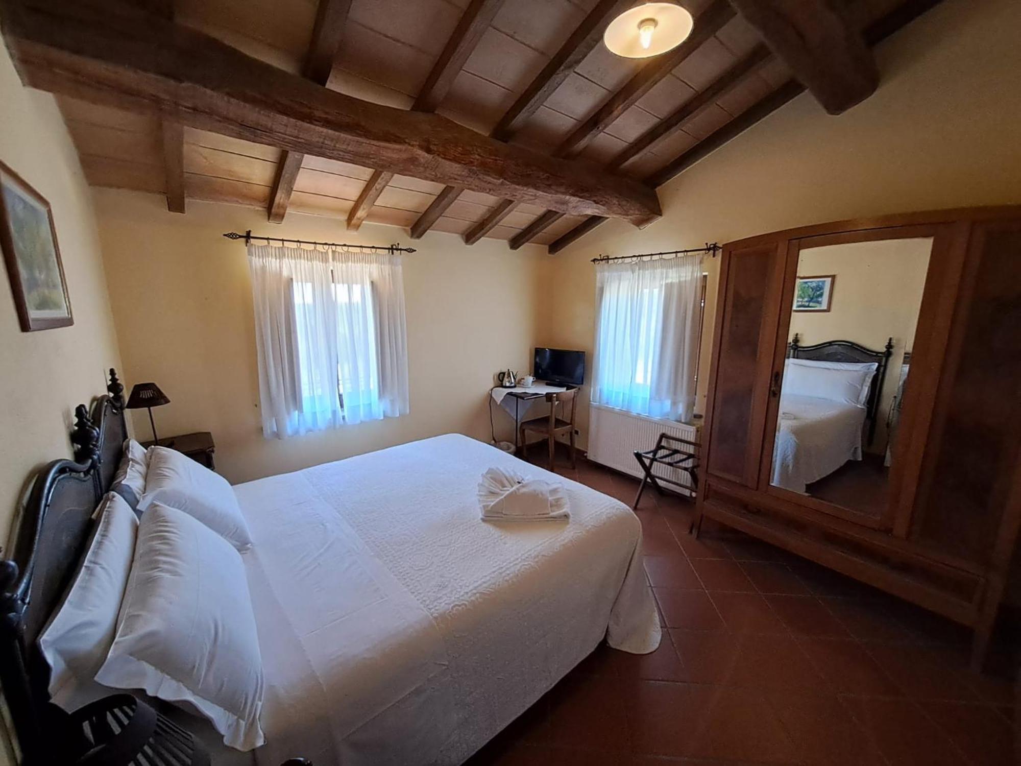 Agriturismo Le Case Asís Exterior foto